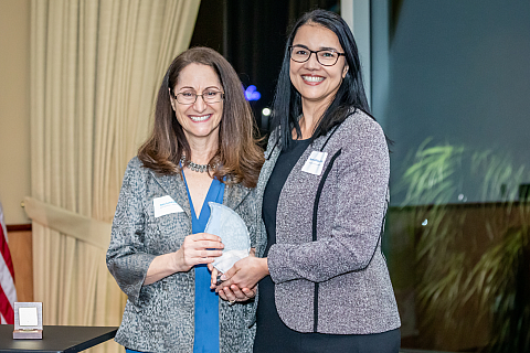 Hala Sandrige, recipient of the 2022 Judge Don Castor Award, presented by board member Sarah Lahlou-Amine.