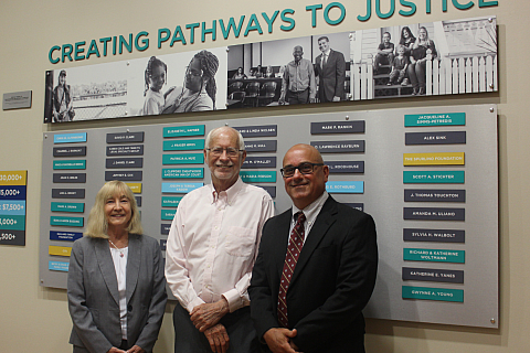 Image of Tony Cabassa with Dick Woltmann (CEO) and Joan Boles (Deputy Director)