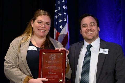 Calli Burnett accepts Outstanding Government/Non-Profit Lawyer Award
