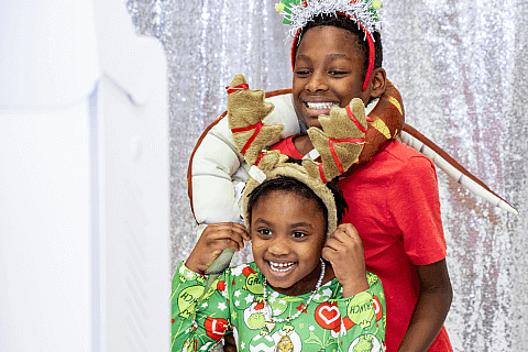 Brother and Sister at Holiday Party