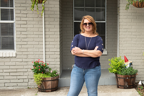 Client in front of house